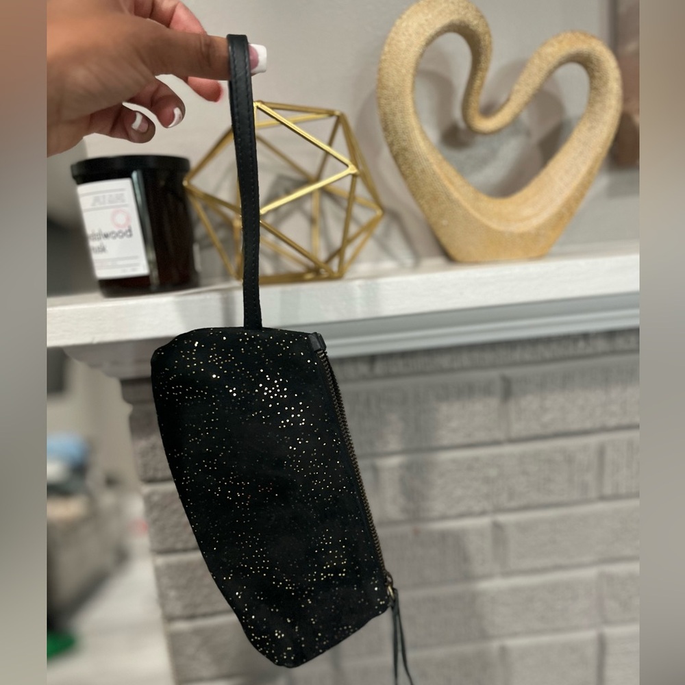 Elegant Black Wristlet with Gold Accents